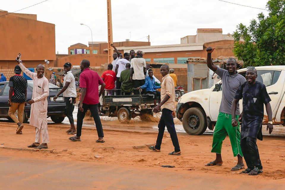 Nigerien men gather for an anti-French protest in Niamey, Niger, Friday, Aug. 11, 2023.The ECOWAS bloc said it had directed a "standby force" to restore constitutional order in Niger after its deadline to reinstate ousted President Mohamed Bazoum expired. (AP Photo/Sam Mednick)