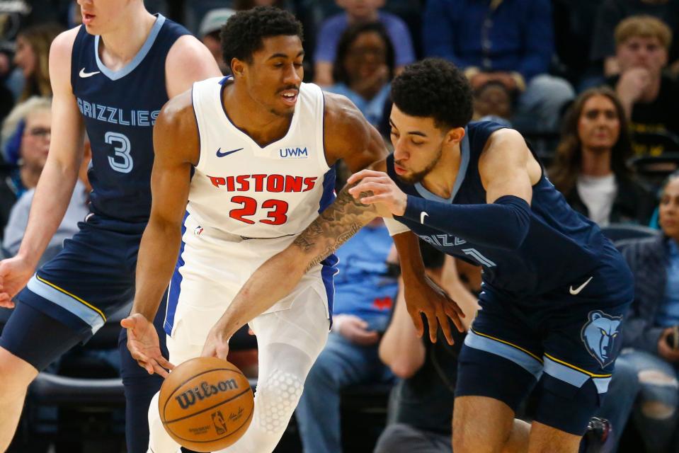 Grizzlies guard Scotty Pippen Jr. knocks the ball away from Pistons guard Jaden Ivey during the first half on Friday, April 5, 2024, in Memphis, Tennessee.