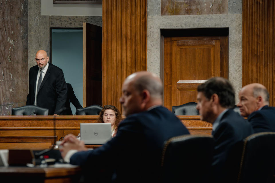 Fetterman walks into a Senate Banking, Housing, and Urban Affairs Committee hearing<span class="copyright">Shuran Huang for TIME</span>