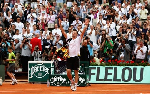 Robin Soderling of Sweden salutes the fans following his victory during the Men's Singles Fourth Round match against reigning champion Rafael Nadal of Spain on day eight of the French Open at Roland Garros on May 31, 2009 in Paris, France - Credit: Getty Images