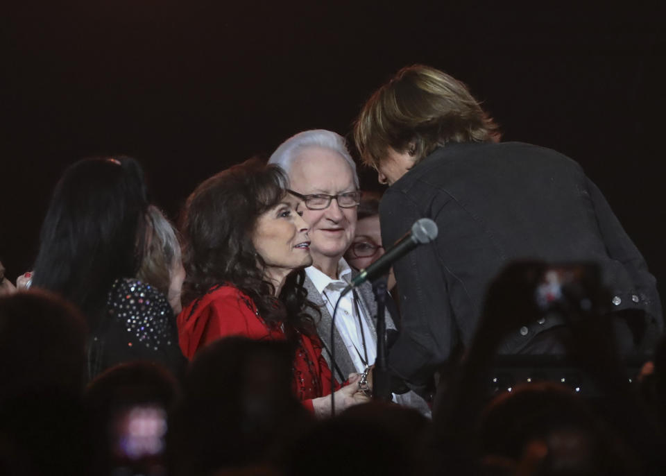 Keith Urban, right, wishes Loretta Lynn a happy birthday at Loretta Lynn's 87th Birthday Tribute at Bridgestone Arena on Monday, April 1, 2019, in Nashville, Tenn. (Photo by Al Wagner/Invision/AP)