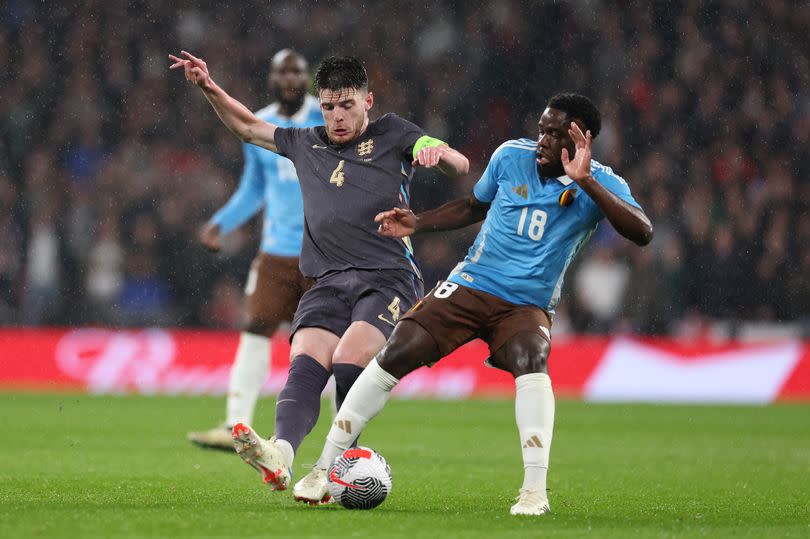 Orel Mangala battles for the ball with Declan Rice during Belgium's 2-2 draw with England at Wembley