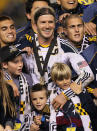 CARSON, CA - NOVEMBER 20: David Beckham #23 of the Los Angeles Galaxy celebrates with his sons Brooklyn, Cruz and Romeo after defeating the Houston Dynamo 1-0 to win the 2011 MLS Cup at The Home Depot Center on November 20, 2011 in Carson, California. (Photo by Stephen Dunn/Getty Images)