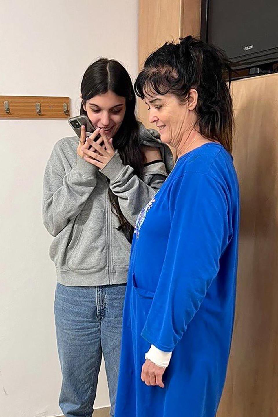 Natalie Shoshana Raanan and Judith Tai Raanan speaking on the phone with U.S. President Joe Biden on Oct. 20, 2023, after being held hostage by Hamas.