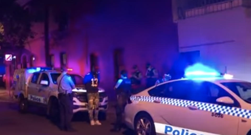 Police arrest a man in Surry Hills, Sydney.