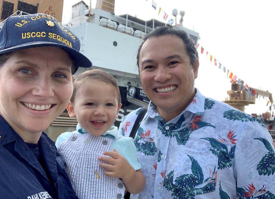 Cmdr. Linden Dahlkemper with her son, Clarke Vingua, and husband, Mark Vingua in front of the USCGC Sequoia. Dahlkemper's husband and son moved to Guam with her when she took over command of Sequoia in  July.