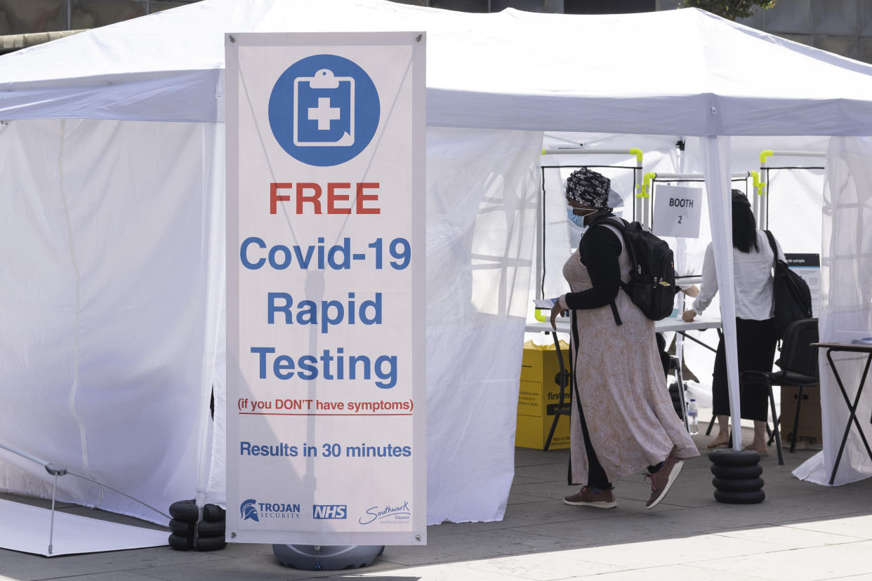 LONDON, ENGLAND - JUNE 15: A Covid-19 rapid testing facility is set up in Elephant and Castle on June 15, 2021 in London, England. Around 30 million people, or 45 percent, in the UK are fully vaccinated against Covid-19, but the government has postponed the full easing of social restrictions for another month, to allow time to expand its vaccination programme even further. (Photo by Dan Kitwood/Getty Images)