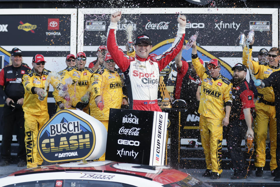 Erik Jones celebrates in Victory Lane after winning the NASCAR Busch Clash auto race at Daytona International Speedway, Sunday, Feb. 9, 2020, in Daytona Beach, Fla. (AP Photo/John Raoux)