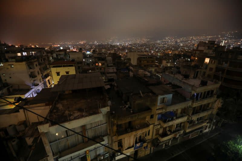 Buildings are seen at night during a power cut in some areas in Beirut