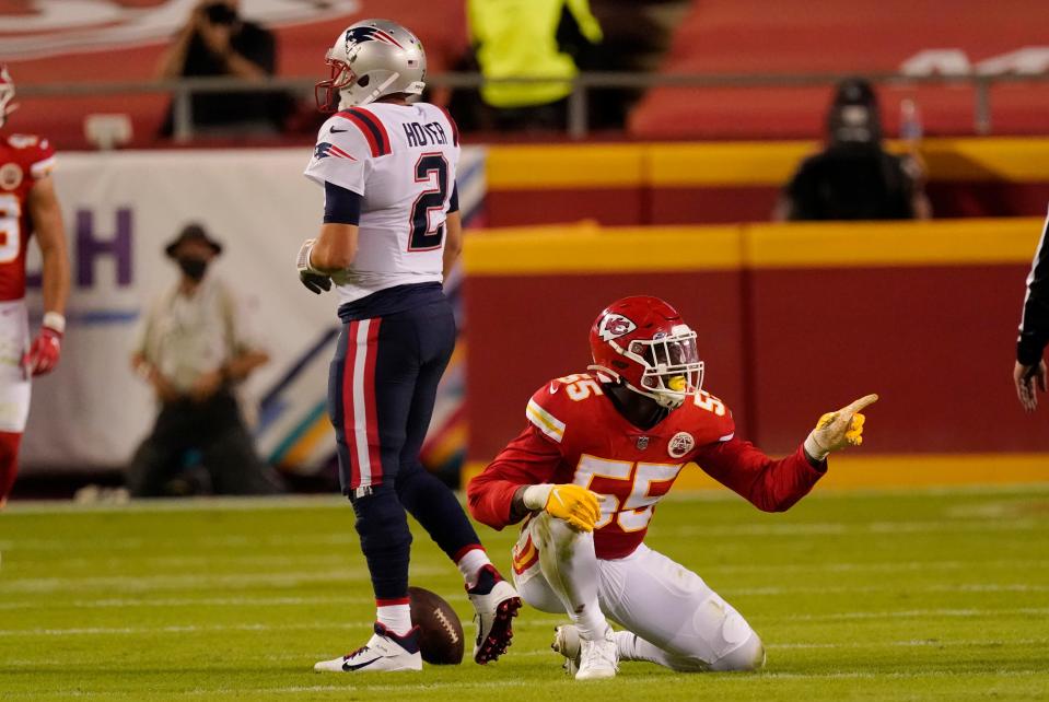 Chiefs defensive end Frank Clark celebrates after sacking Patriots quarterback Brian Hoyer during the game on Oct. 5, 2020, in Kansas City.