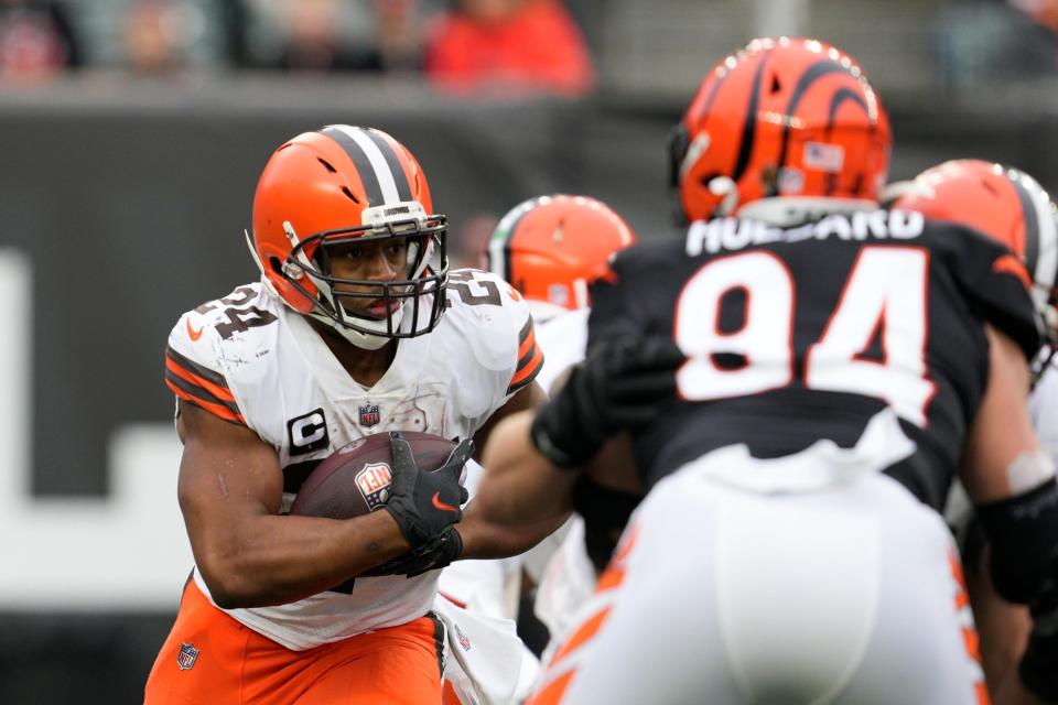 Cleveland Browns' Nick Chubb runs during the second half of an NFL football game against the Cincinnati Bengals, Sunday, Dec. 11, 2022, in Cincinnati. (AP Photo/Jeff Dean)