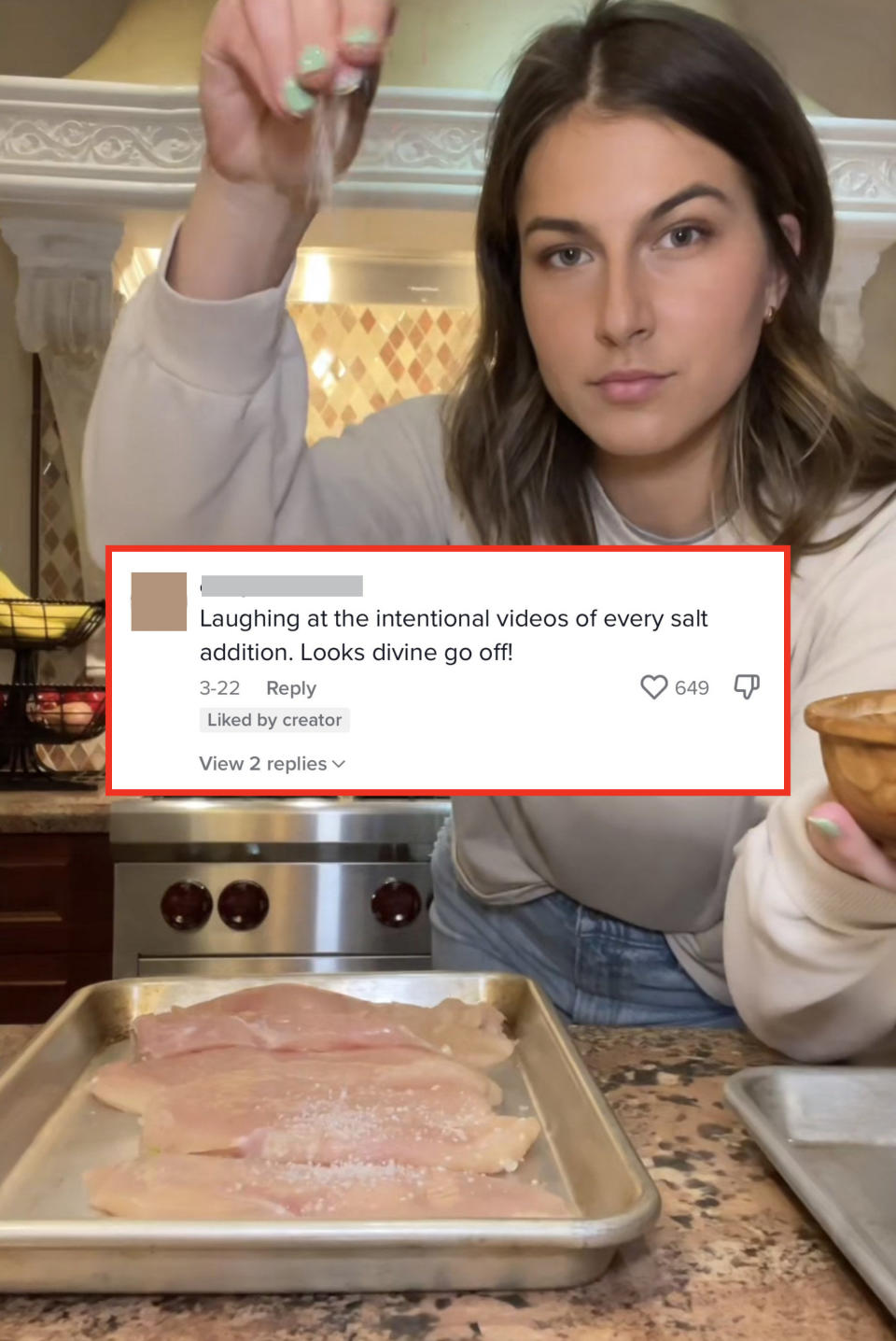 Zoe looking into the camera while sprinkling salt over raw chicken, with comment, "Laughing at the intentional videos of every salt addition; looks divine go off!"