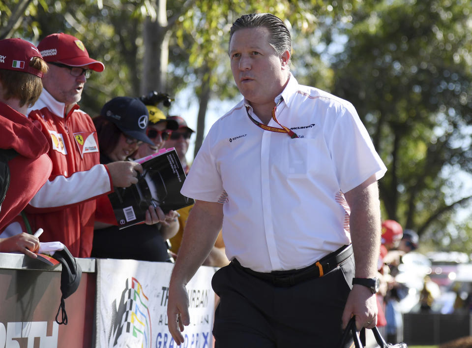 FILE - Zak Brown, CEO of McLaren, arrives at the track for the Australian Formula One Grand Prix in Melbourne, Thursday, March 12, 2020. McLaren returned to IndyCar competition with high hopes to re-establish itself in the United States and mold its entire racing operation into America's team. It took only two seasons in IndyCar — coupled with a strong turnaround in Formula One — for the brand to reinvent itself. (AP Photo/Andy Brownbill, File)