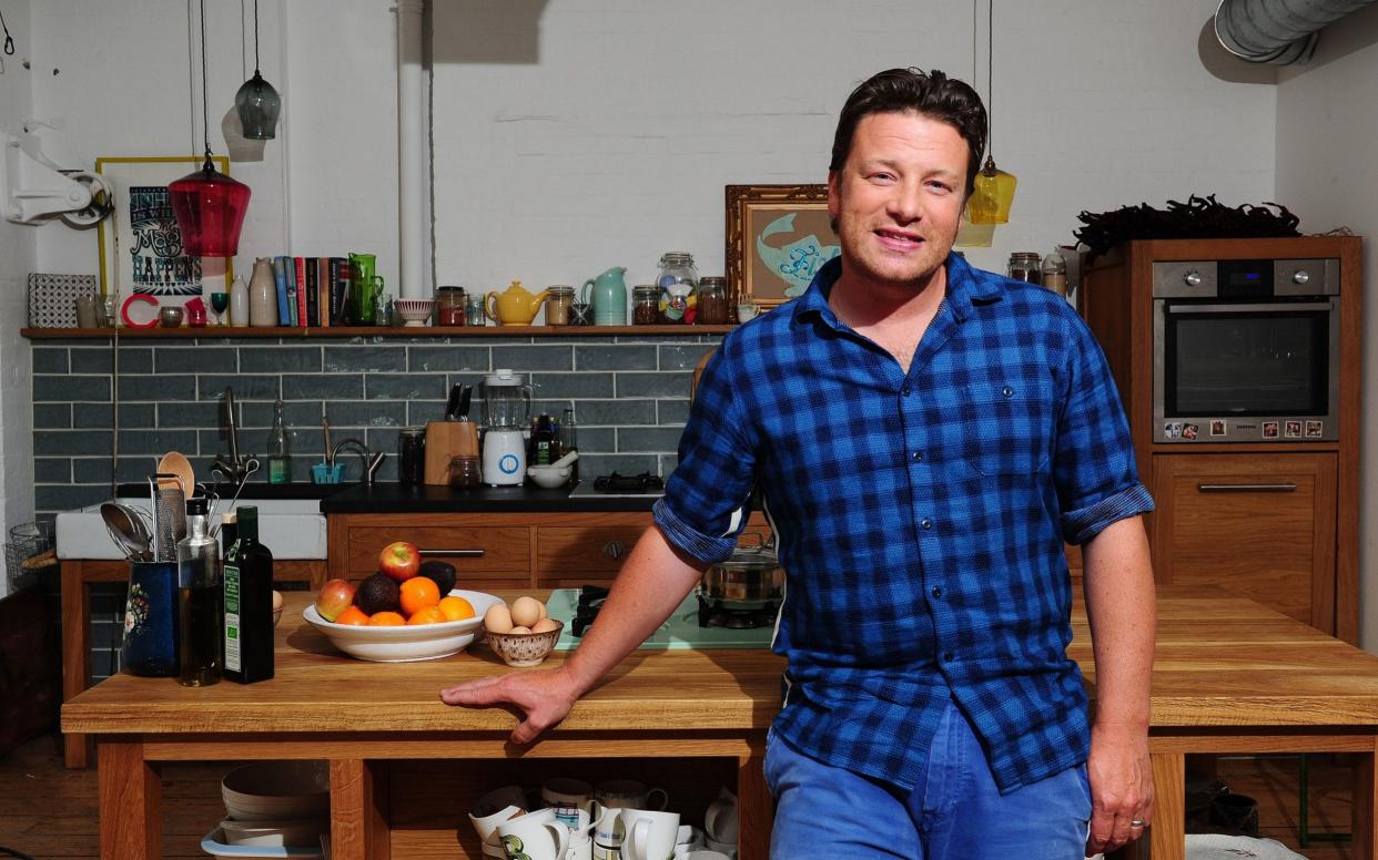 Jamie Oliver has blamed Brexit for the demise of his restaurant group - PA