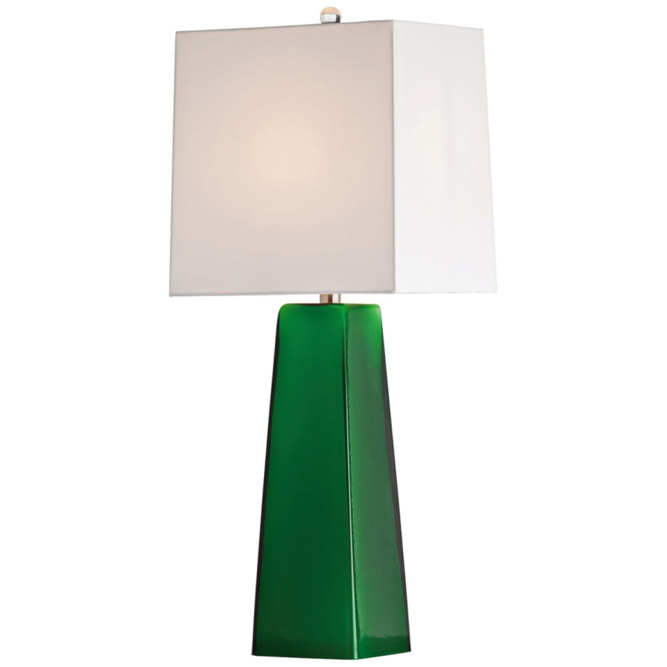 This undated publicity photo provided by Lamps Plus shows a table lamp, Arteriors Home’s Roma lamp in emerald green cased glass, a great addition that freshens up a spring room (www.lampsplus.com). (AP Photo/Lamps Plus)