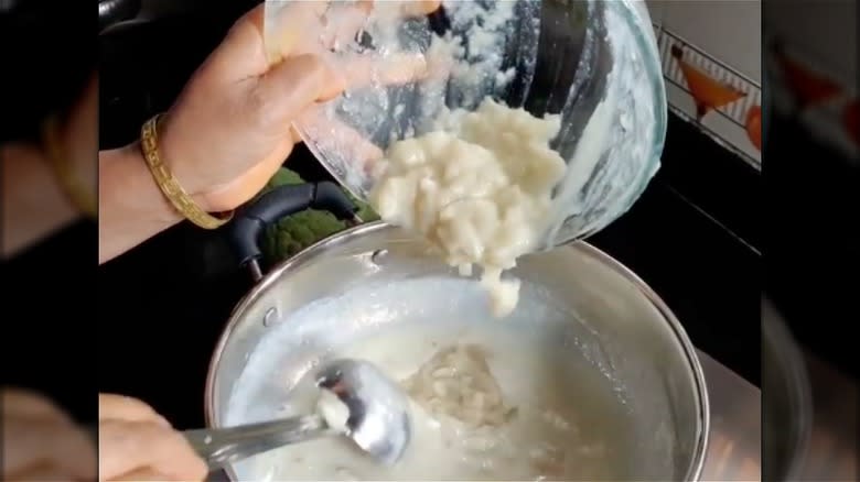 Preparing sitaphal cream in a bowl