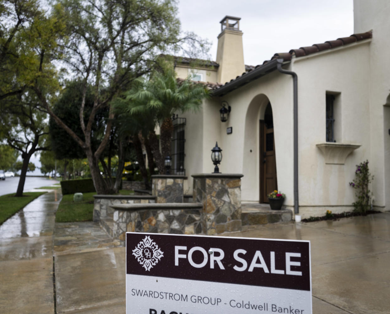 IRVINE, CA - November 15: A for sale sign sits outside a home in the 100 block of Mosaic in Irvine, CA on Wednesday, November 15, 2023. (Photo by Paul Bersebach/MediaNews Group/Orange County Register via Getty Images)