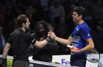 Britain Tennis - Barclays ATP World Tour Finals - O2 Arena, London - 19/11/16 Great Britain's Andy Murray and Canada's Milos Raonic after their semi final match Reuters / Toby Melville Livepic