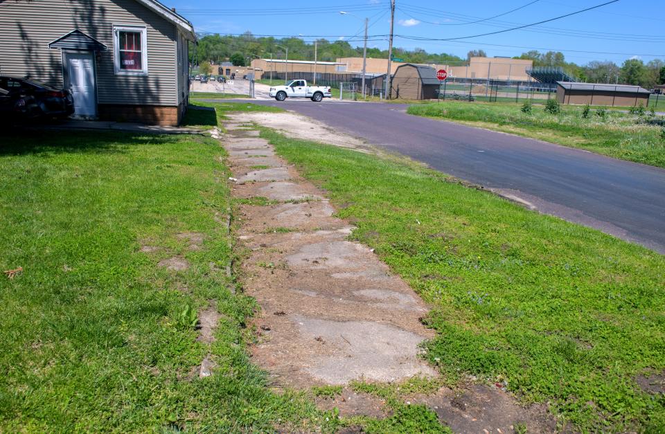 A section of sidewalk still remains along S. Ligonier Street near Manual High School in South Peoria.