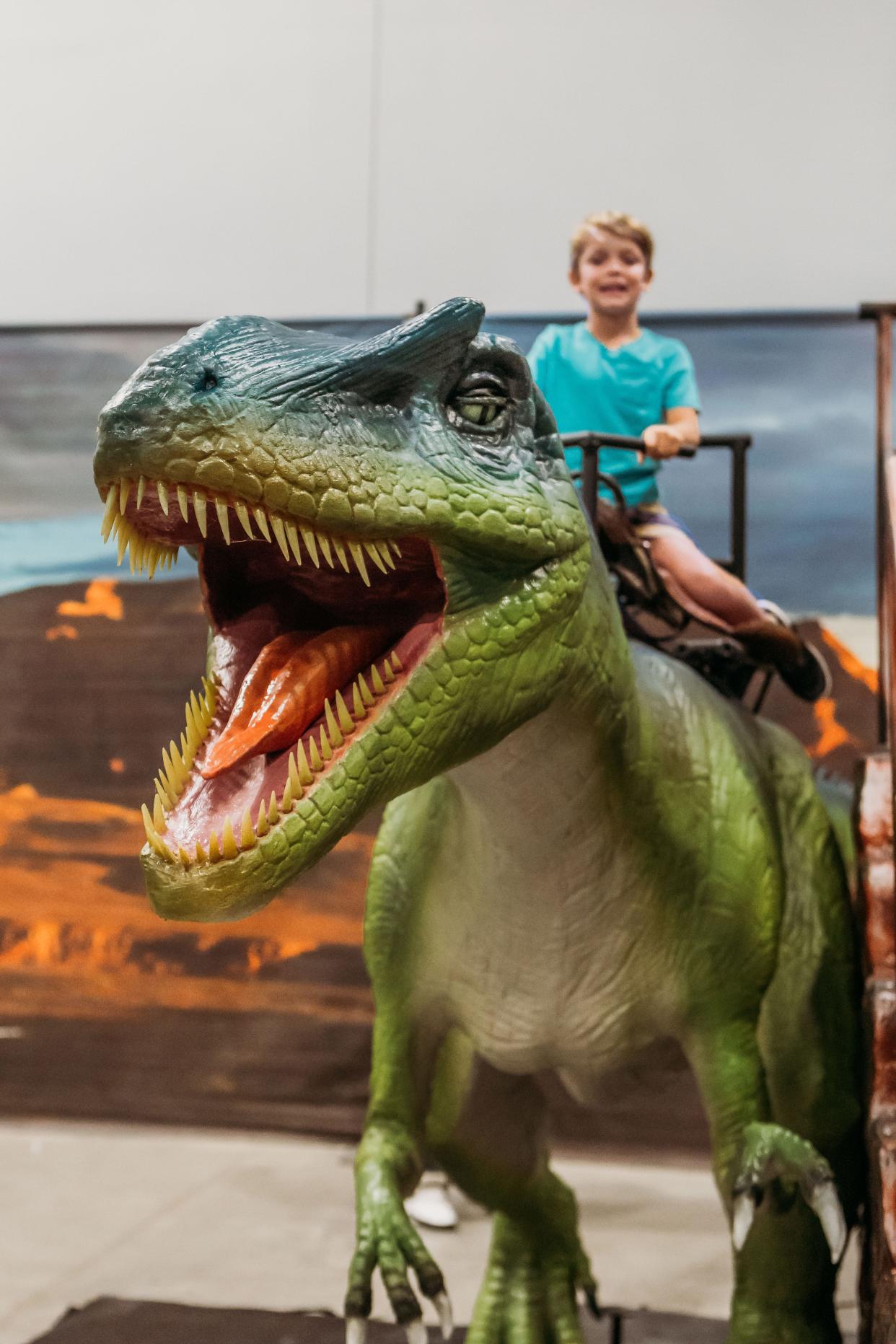 Kids can even ride some of the dinosaurs at Jurassic Quest.