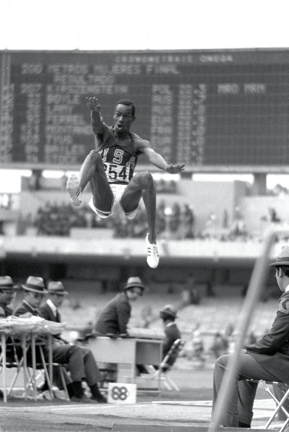 Bob Beamon of the USA breaks the long Jump world record by almost 23 inches during the 1968 Olympic Games in Mexico City. Beamon soared 29 feet, 2 1/2 inches in the thin air.