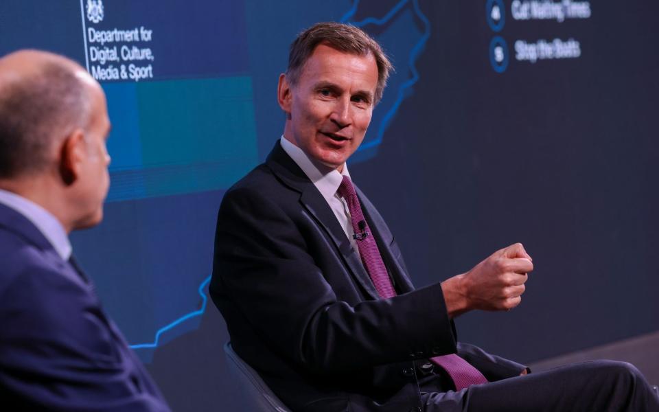 Jeremy Hunt, the Chancellor, is pictured this morning after delivering a speech on the economy at Bloomberg's HQ in central London - Chris Ratcliffe/Bloomberg 