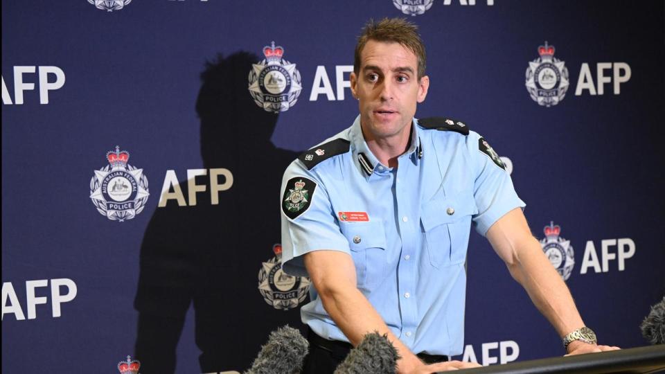 AFP Detective Superintendent Adrian Telfer speaks to media