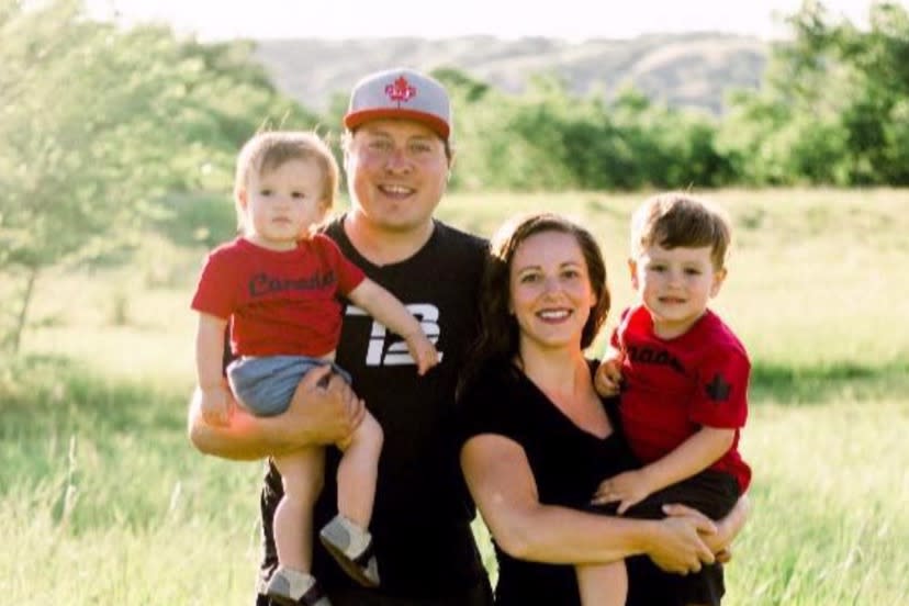 Picture of Aly and Scott Jenkins with their two children Brady and Avery.