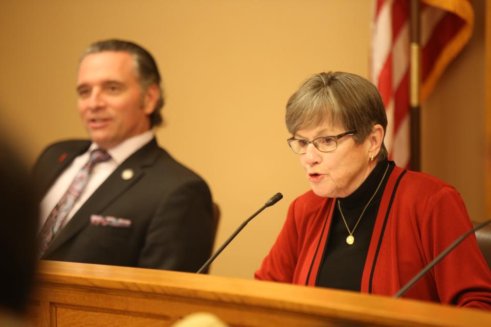 Gov. Laura Kelly speaks as Senate President Ty Masterson listens. The state announced Wichita-based semiconductor company Integra Technologies will get Kansas taxpayer-funded economic development incentives for APEX megaprojects.