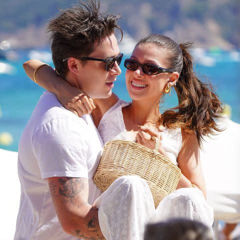 <p>EliotPress / ELIOTPRESS / MEGA</p> Brooklyn Beckham and wife Nicola Peltz Beckham in Saint-Tropez in July.