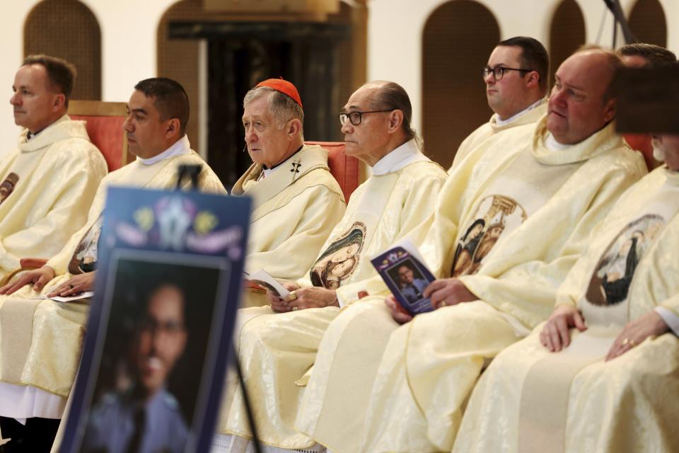 Cardinal Blase Cupich, third from left, attends the funeral for Chicago police Officer Luis M. Huesca on April 29, 2024, in Chicago. Hundreds of mourners lined the streets to say farewell to the police officer who was shot to death while off-duty and heading home from work. (Antonio Perez/Chicago Tribune via AP, Pool)