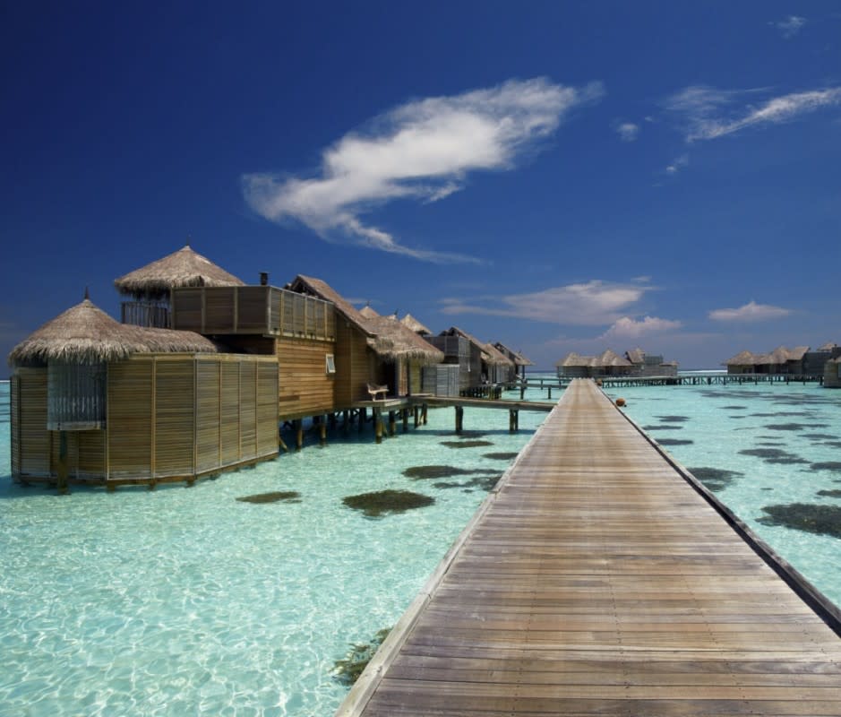 <p>The Maldives have more overwater hotels than anywhere else in the world, but the <a href="https://gili-lankanfushi.com/" rel="nofollow noopener" target="_blank" data-ylk="slk:Gili Lankanfushi;elm:context_link;itc:0;sec:content-canvas" class="link ">Gili Lankanfushi</a> stands out among them all.</p><p>“The Gili Lankanfushi was first established as a Six Senses resort, and it still keeps the same casual, barefoot vibe,” Wade says. “The water villas are huge and also unique in that they each have large outdoor areas rather than just a private deck. Also, the Gili Lankanfushi is home to the world’s largest water villa, at over 18,000 square feet, and it’s only accessible by private boat.”</p><p>All 45 overwater villas here feel like your own private island escape, but the aforementioned world’s largest overwater villa—the Private Reserve—with an infinity pool, a spa pavilion with a sauna and steam room, an air-conditioned gym, a cinema, and a water slide that drops into the sea is in a category of its own.</p> 