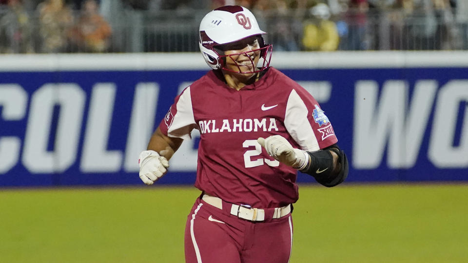 FILE - Oklahoma's Tiare Jennings runs during the first game of the NCAA Women's College World Series softball championship series against Texas, on June 8, 2022, in Oklahoma City. Jennings may be the nation’s best player. She dominated at last year's Women’s College World Series, setting records with 15 RBIs and five home runs. (AP Photo/Sue Ogrocki, File)