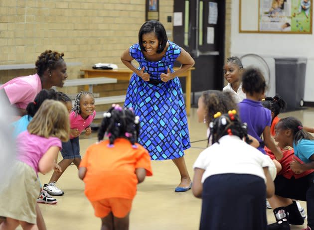 <b>17 septembre</b><br> Petit pas de danse pour la First Lady Michelle Obama dans une école de Gainesville, en Floride. <br> (AP/Phil Sandlin)