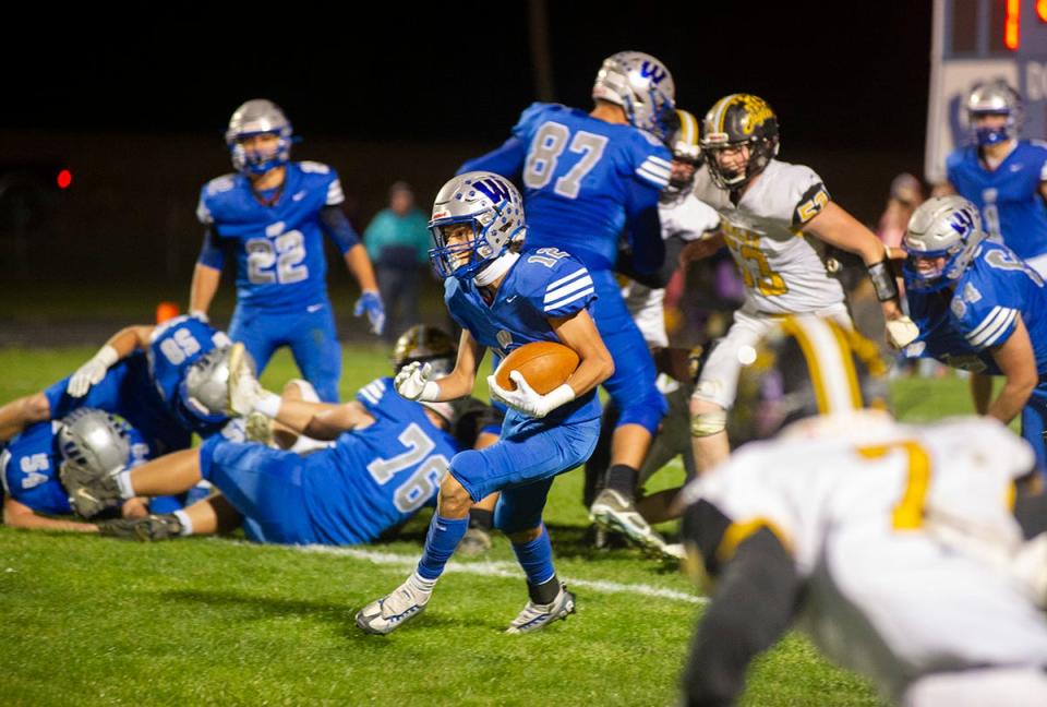 Wynford's Anthony Evans makes a move into open space.