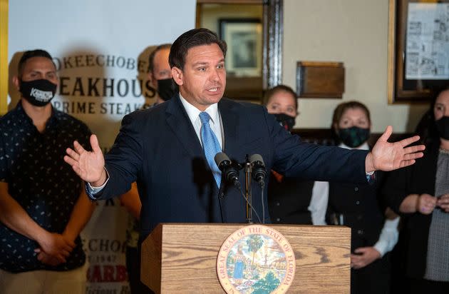 Florida Gov. Ron DeSantis vows to keep restaurants open during COVID-19 at a news conference on Dec. 15, 2020, at Okeechobee Steakhouse in West Palm Beach, Florida. 