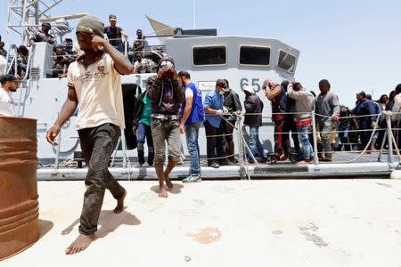 Migrants arrive at a naval base after being rescued by Libyan coast guards in Tripoli, Libya June 29, 2018. REUTERS/Ismail Zitouny