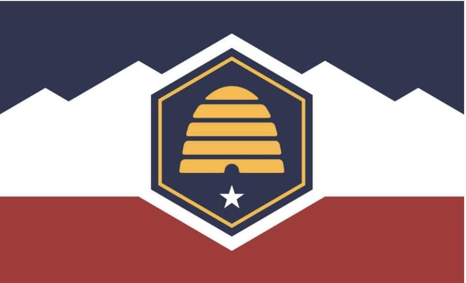 The proposed new state flag for Utah includes symbols for red rock, snowy mountains, blue skies and an industrious beehive. The five-pointed star beneath the beehive was proposed to represent the state's five historic Native American tribes.