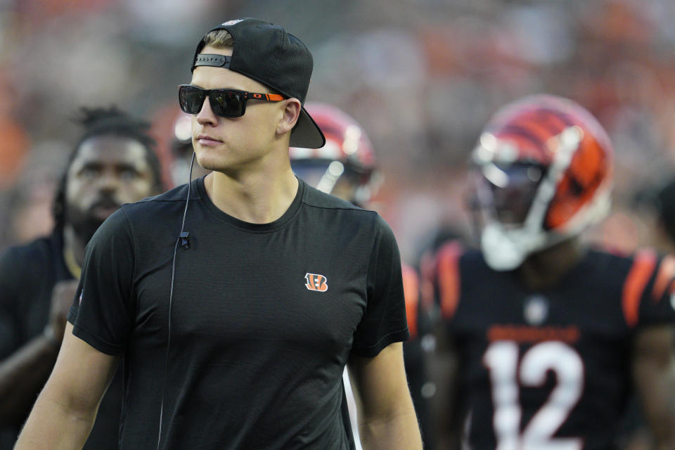 Cincinnati Bengals quarterback Joe Burrow walks on the sideline during the first half of the team's preseason NFL football game against the Green Bay Packers on Friday, Aug. 11, 2023, in Cincinnati. (AP Photo/Jeff Dean)