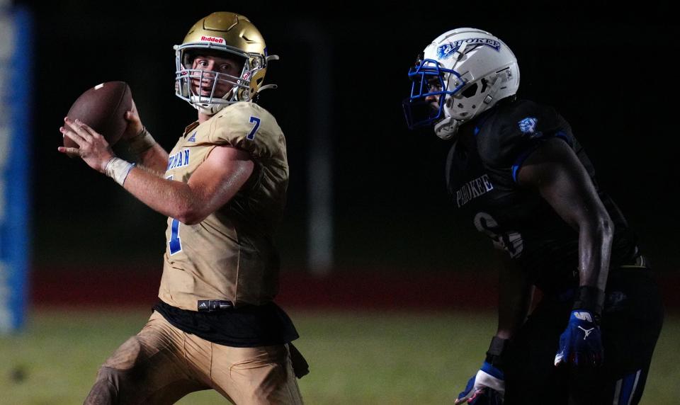 Cardinal Newman quarterback Luke Warnock (7) looks to pass as DeeJay Holmes (6) of Pahokee follows on the play on Aug. 25.