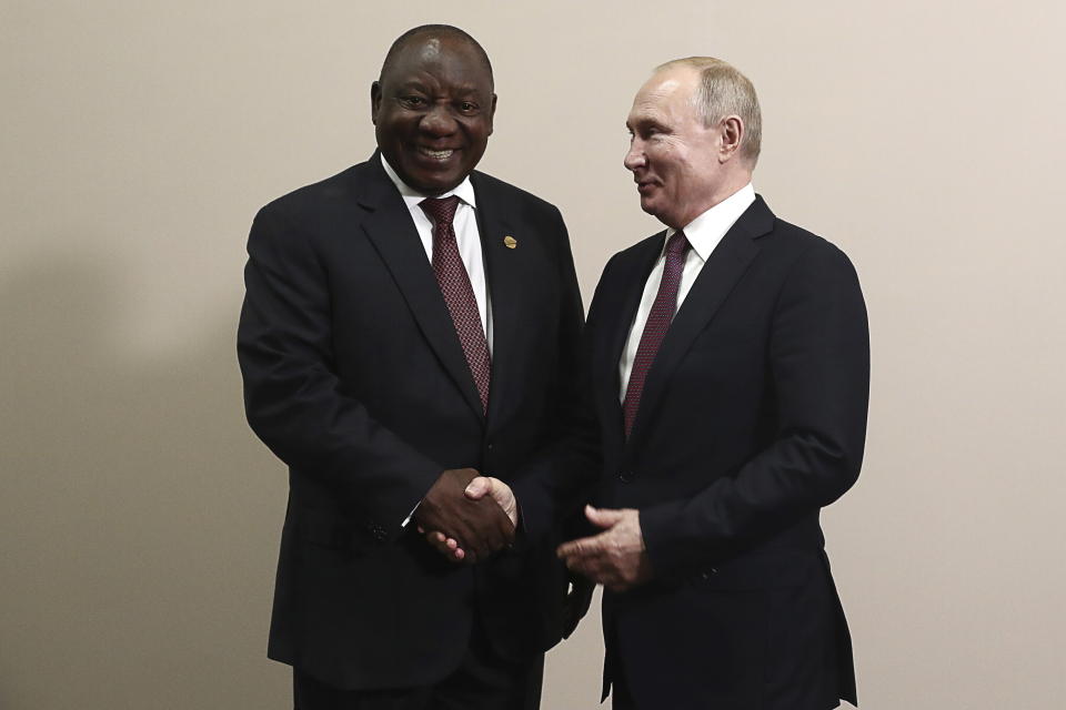 Russian President Vladimir Putin, right, and South Africa's President, Cyril Ramaphosa pose for a photo prior to their talks on the sideline of Russia-Africa summit in the Black Sea resort of Sochi, Russia, Wednesday, Oct. 23, 2019. (Sergei Fadeyechev, TASS News Agency Pool Photo via AP)