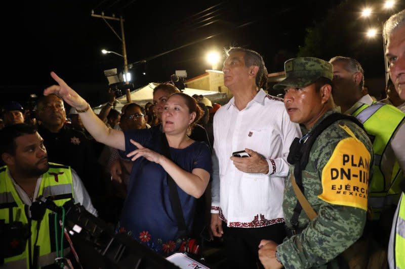 Tamaulipas Gov. Americo Villarreal (C) supervises search-and-recovery efforts and the site of a church collapse in Mexico's Madero city on Sunday. Photo courtesy of Government of Tamaulipas/Facebook