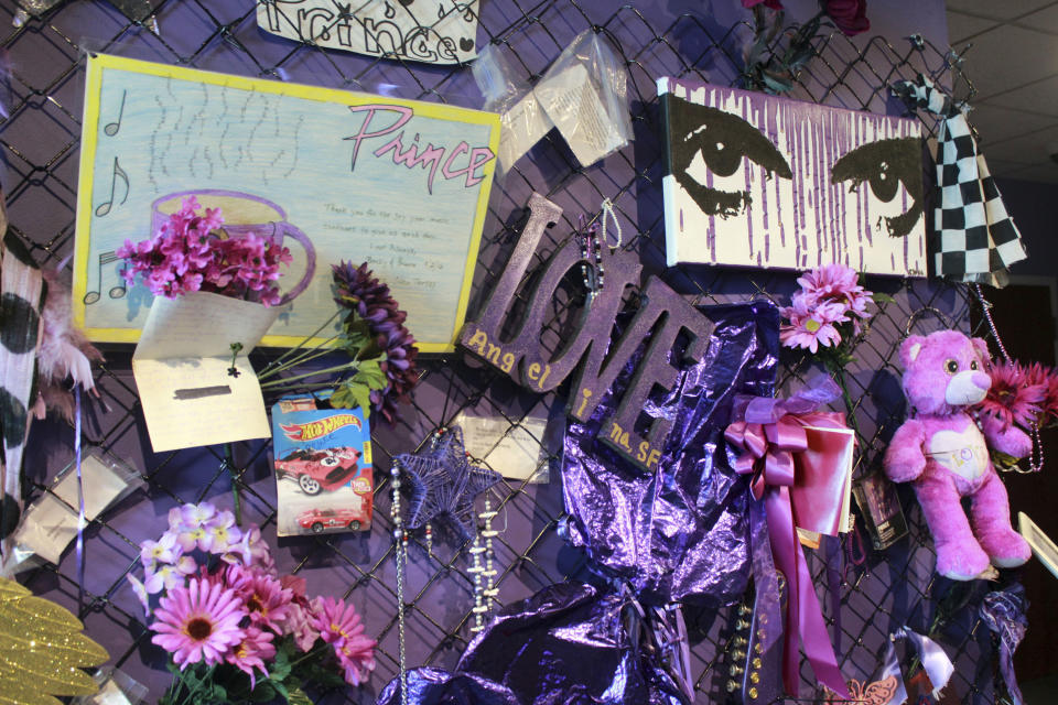 FILE - In this Nov. 2, 2016, file photo, a replica of the Memorial Fence is shown at Prince's Paisley Park in Chanhassen, Minn. which is open for public tours. The one-year anniversary of the rock star's death from an overdose will be marked April 21. (AP Photo/Jeff Baenen, File)