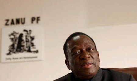 FILE PHOTO: Zimbabwe's President Emmerson Mnangagwa looks on as he chairs ZANU PF's Politburo meeting in Harare, Zimbabwe, December 13, 2017.    REUTERS/Philimon Bulawayo/Files