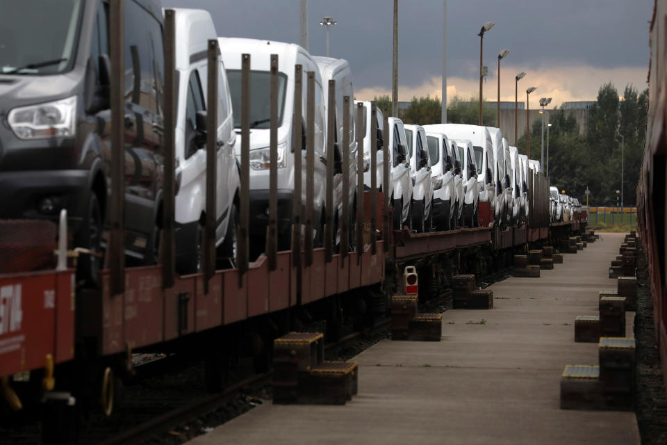 Image: Ford Transit vans sit loaded on a transporter train at the Ford Motor Co.s engine assembly plant in Dagenham, U.K. (Luke MacGregor / Bloomberg via Getty Images file)