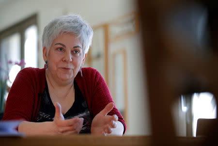 Corinne Francois, opponent to the project of an underground nuclear waste disposal of the French National Radioactive Waste Management Agency ANDRA in the village of Bure called CIGEO, talks to Reuters journalists during an interview at her home in Bar-le-Duc, France, April 6, 2018. Picture taken April 6, 2018. REUTERS/Vincent Kessler