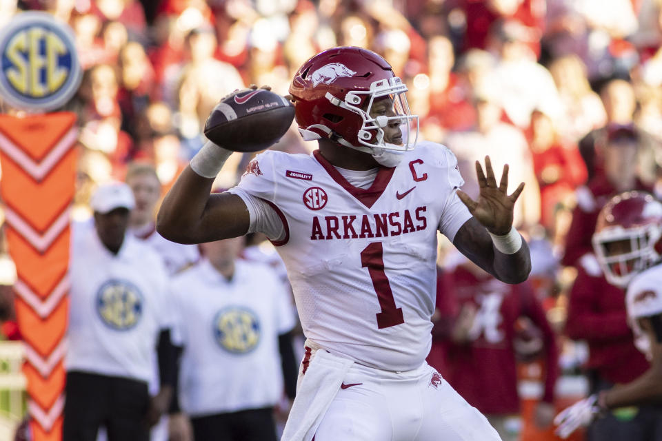 FILE - Arkansas quarterback KJ Jefferson looks to throw a pass against Alabama during the first half of an NCAA college football game Nov. 20, 2021, in Tuscaloosa, Ala. Arkansas feels confident in Jefferson. In his first year as the Razorbacks' starter, he guided the team to its best record in a decade. He passed for 2,676 yards and ran for 644, combining for 27 touchdowns. (AP Photo/Vasha Hunt, File)