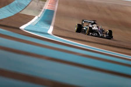 Formula One - F1 - Abu Dhabi Grand Prix - Yas Marina Circuit, Abu Dhabi, United Arab Emirates - 27/11/2016 - Mercedes' Formula One driver Lewis Hamilton of Britain drives during the race. REUTERS/Hamad I Mohammed