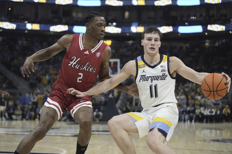 Marquette's Tyler Kolek tries to get past Northern Illinois's Zarique Nutter during the first half of an NCAA college basketball game Monday, Nov. 6, 2023, in Milwaukee. (AP Photo/Morry Gash)