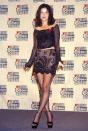 <p>Sandra Bullock wore this two-piece coordinating top and miniskirt look to the 1994 VMAs.</p>